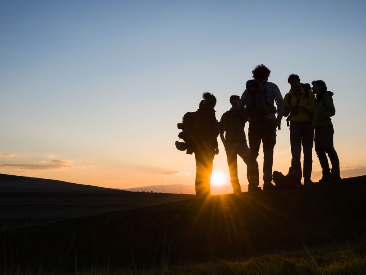 Bergsteiger im Sonnaufgang