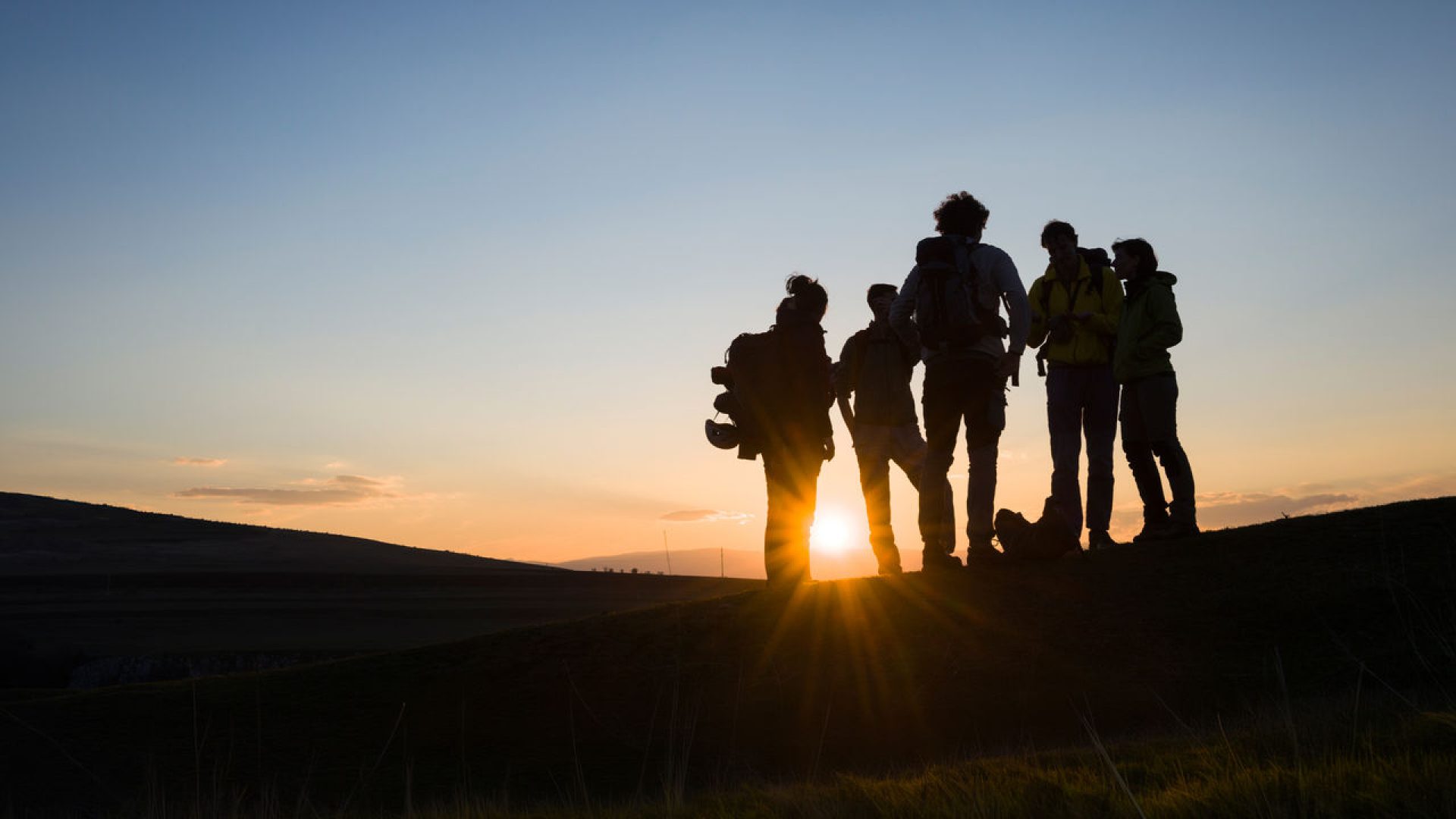 Bergsteiger im Sonnaufgang